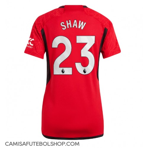 Camisa de time de futebol Manchester United Luke Shaw #23 Replicas 1º Equipamento Feminina 2023-24 Manga Curta